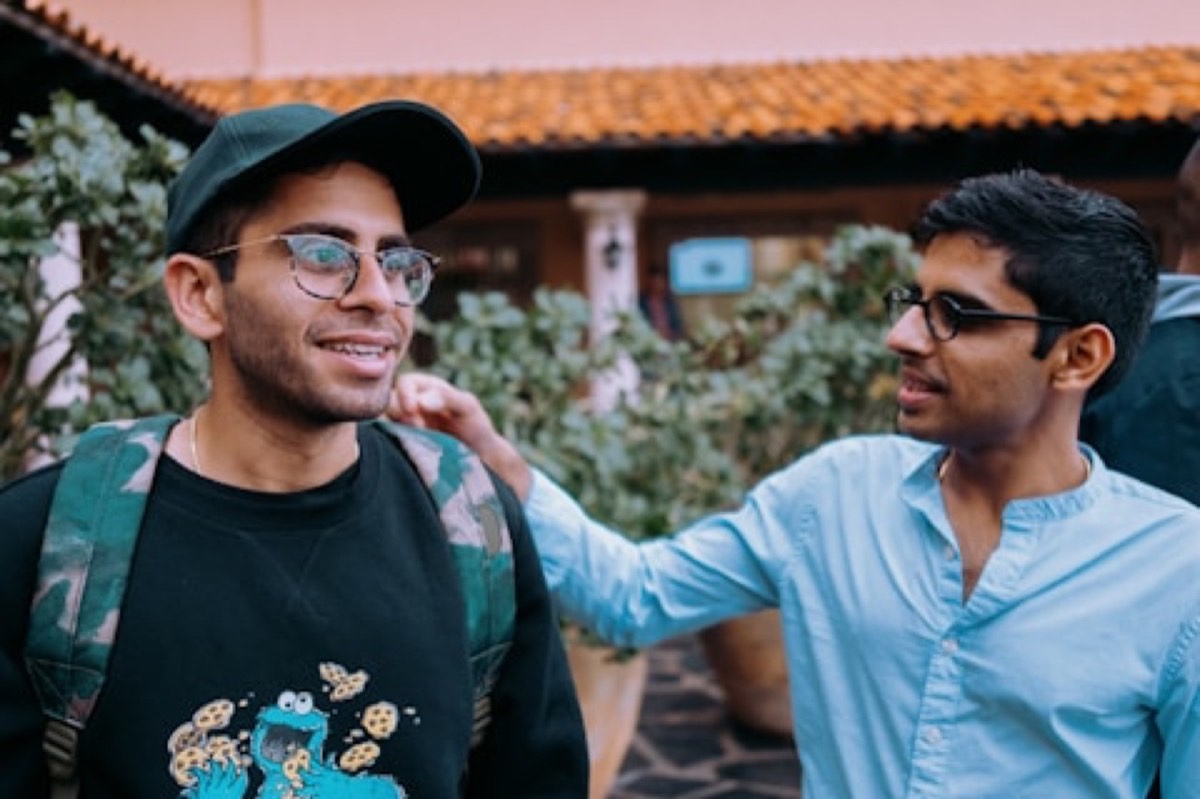 Two friends laughing together